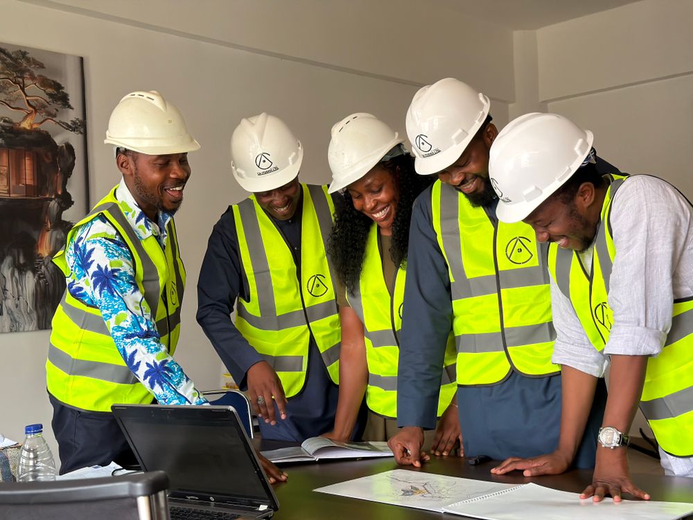 African engineers reviewing development plans